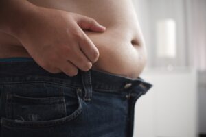 Tummy Tuck vs. Liposuction for Men in Richmond