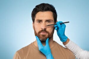 Patient examine for rhinoplasty at Dr. Stanwix Plastic Surgery in Richmond VA